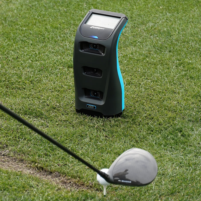 The Foresight Sports GC3S golf launch monitor at the golf range with a driver and ball on tee