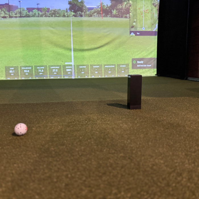 The Square Golf Indoor Launch Monitor in an indoor golf simulato