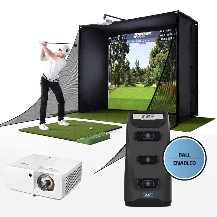 A golfer swinging in a PlayBetter SimStudio home golf simulator with a projector and Foresight Sports launch monitor in the foreground with a "Ball Enabled" badge in the front lower right corner