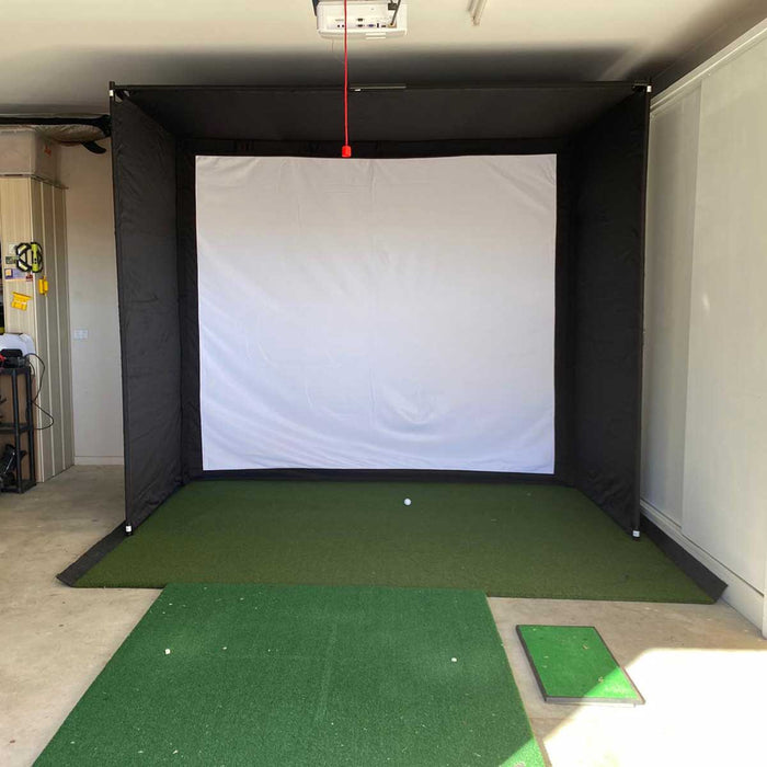 Front view of the PlayBetter SimStudio set up in a garage